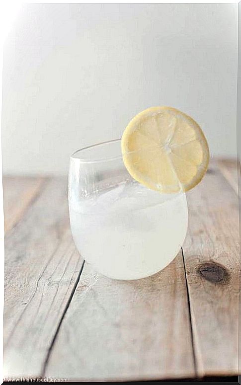 glass of water with a slice of lemon