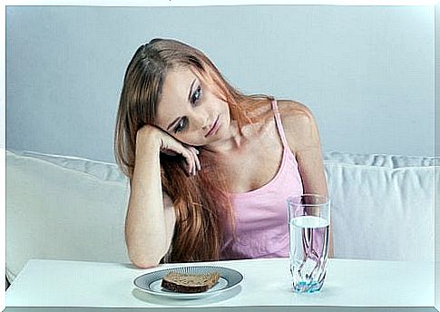 Woman with bread and water