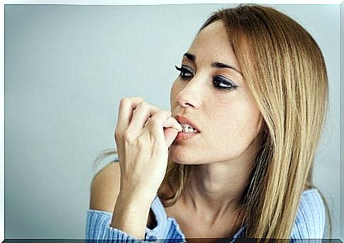 Girl bites her nails