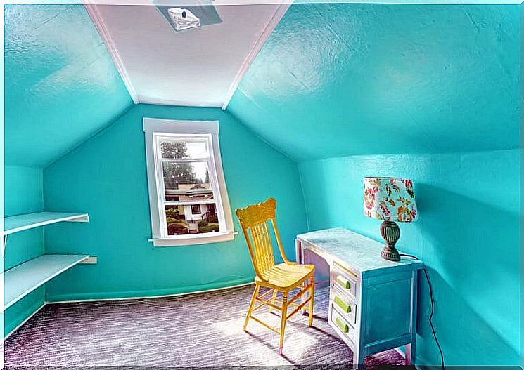 Attic with light blue walls