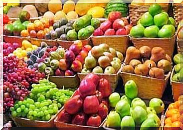 Stand of colorful fruit and vegetables.