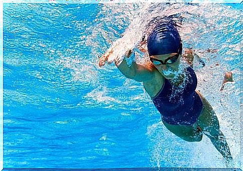 Woman practicing swimming