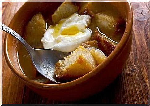 Soup with poached egg