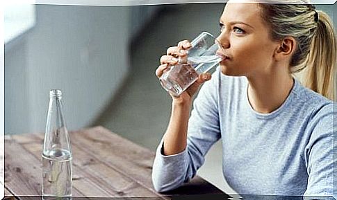 Woman drinks water