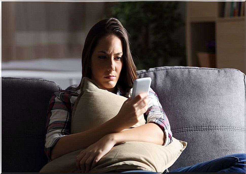 Girl with mobile phone in hand