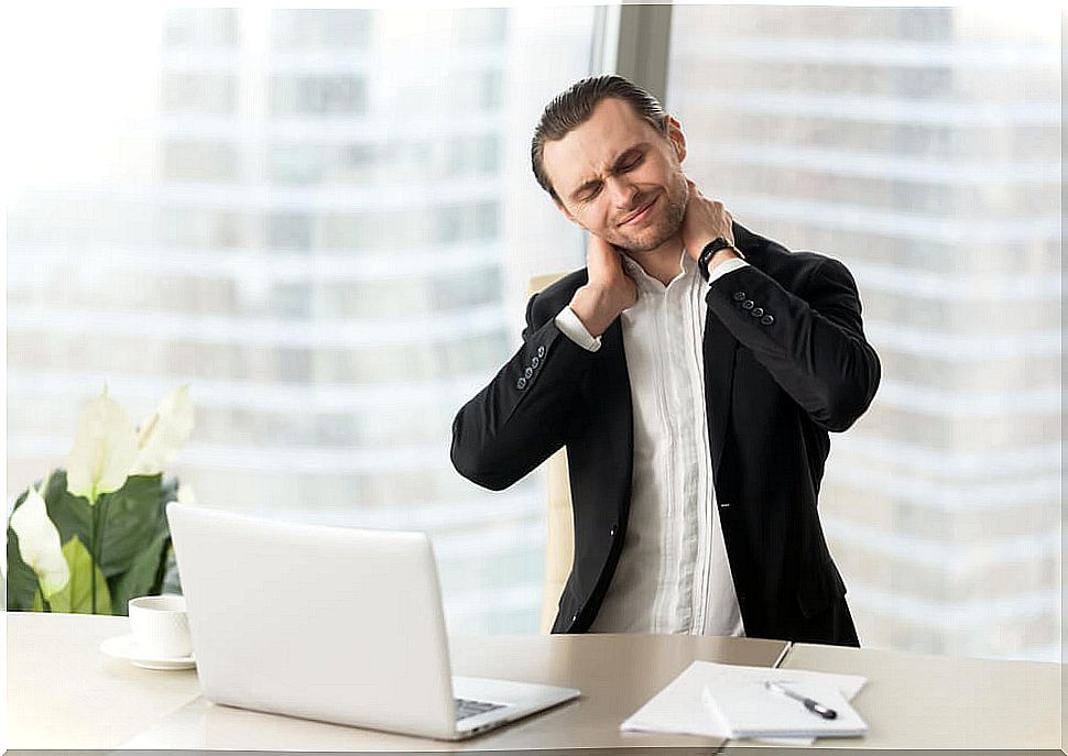 Man with muscle cramp in the neck