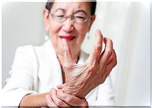 doctor checks the pulse of an elderly person