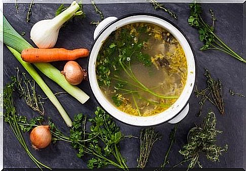 Vegetables and pot with vegetable soup 